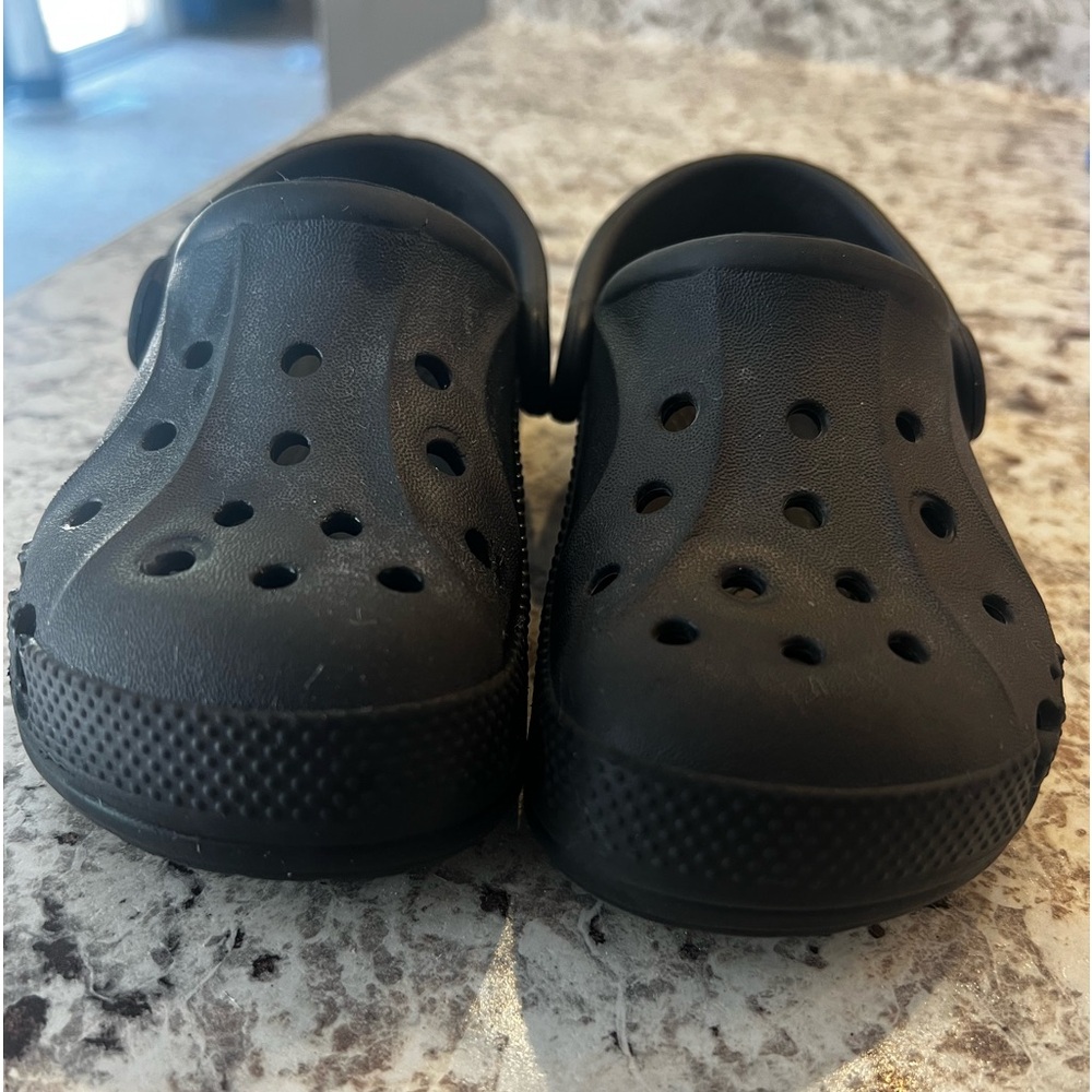 Black 9c crocs. Nothing wrong with them my son just grew out of them!